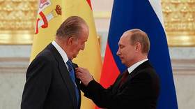 Путин наградил Хуана Карлоса I